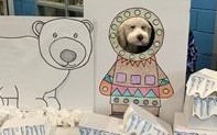 Therapy Dog Samson in Arctic Book Fair Display