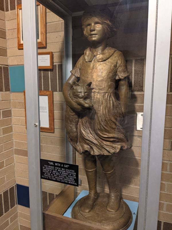 Statue of girl with cat