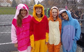Students dressed in costumes for Halloween.