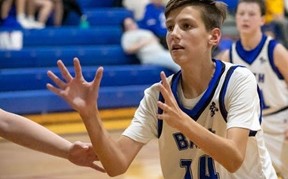 Boys playing basketball.