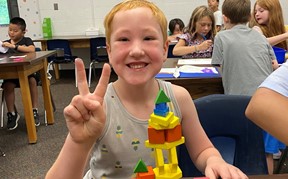 Student in art with blocks