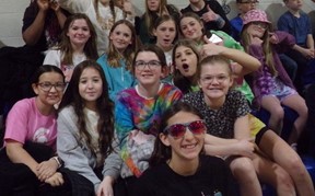 Students in the bleachers at Fun in the Sun Assembly