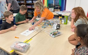 Bee-Botics building their lego submarine