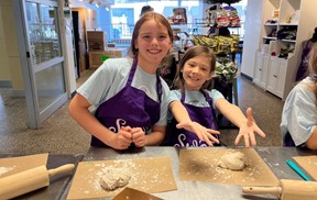 Girls making pizzas