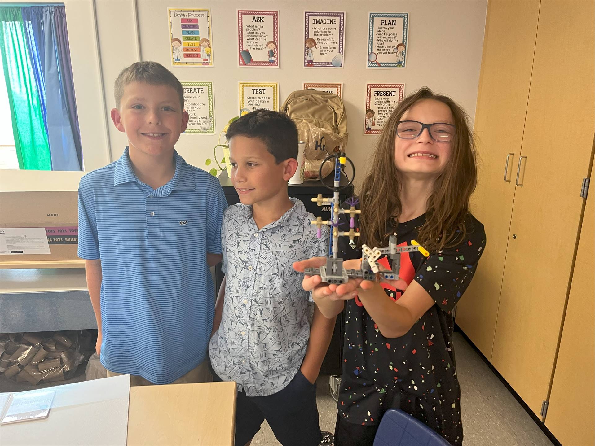 Students showing lego project