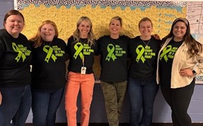 staff members in matching shirts